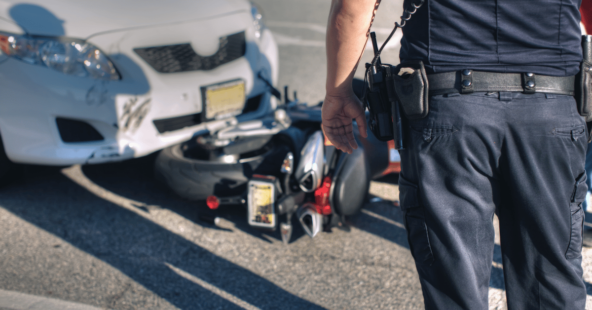 police at car and motorcycle accident