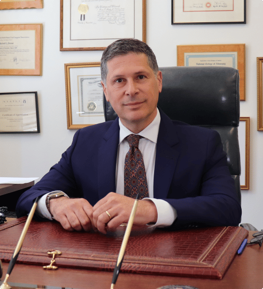 attorney Mitchell Proner sitting at a desk
