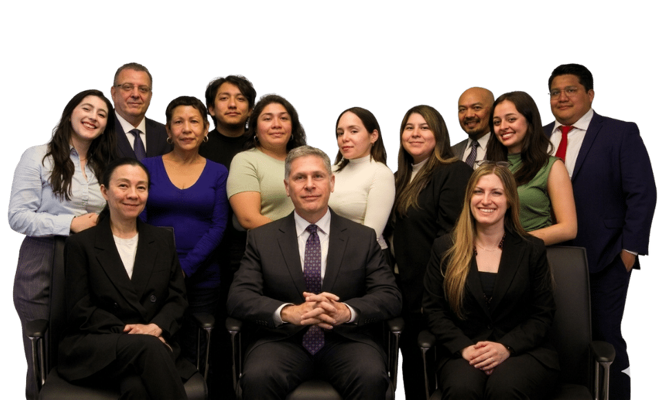 Mitchell Proner seated with the Proner & Proner legal team, representing experienced personal injury attorneys in New York.